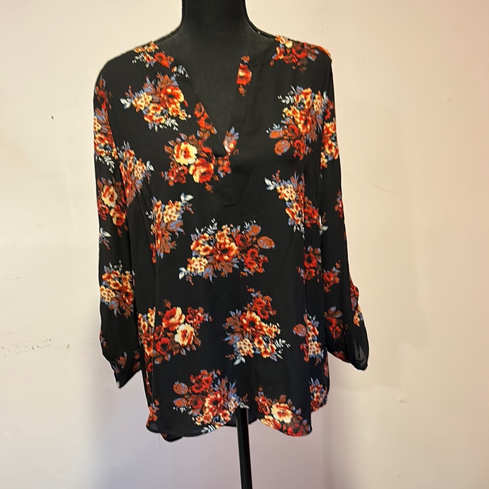 Woman’s floral blouse size Large